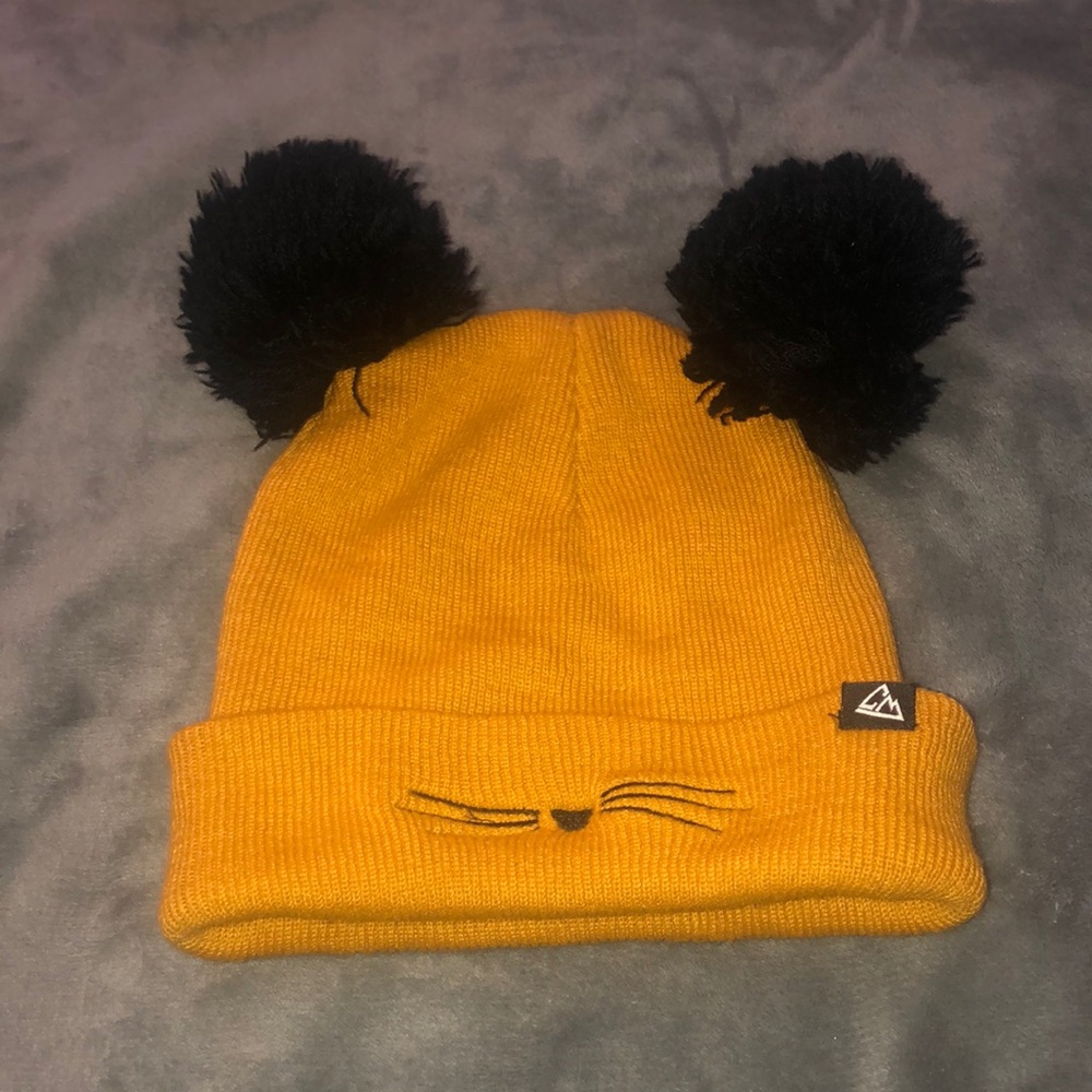 Yellow and Black Knit Beanie with Playful Pom Poms